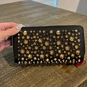 Authentic Christian Louboutin Panettone Spiked Wallet in Black and Gold.